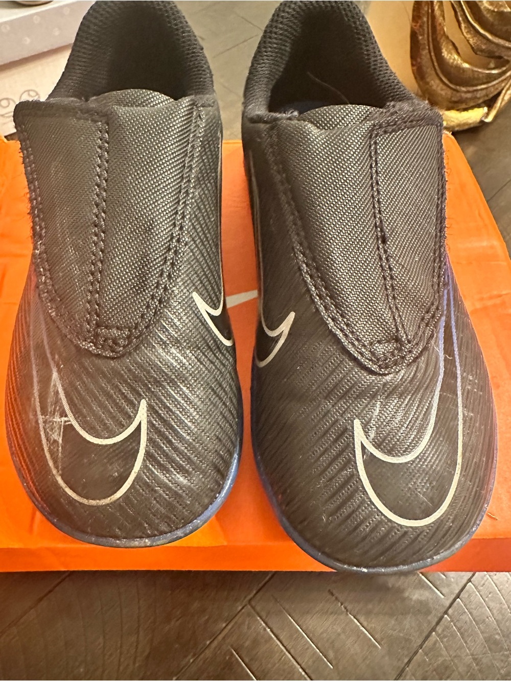Nike Kids Black Slip-On Sneakers with White Swoosh